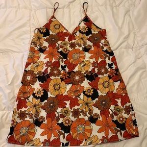 Medium floral 70’s inspired dress.
